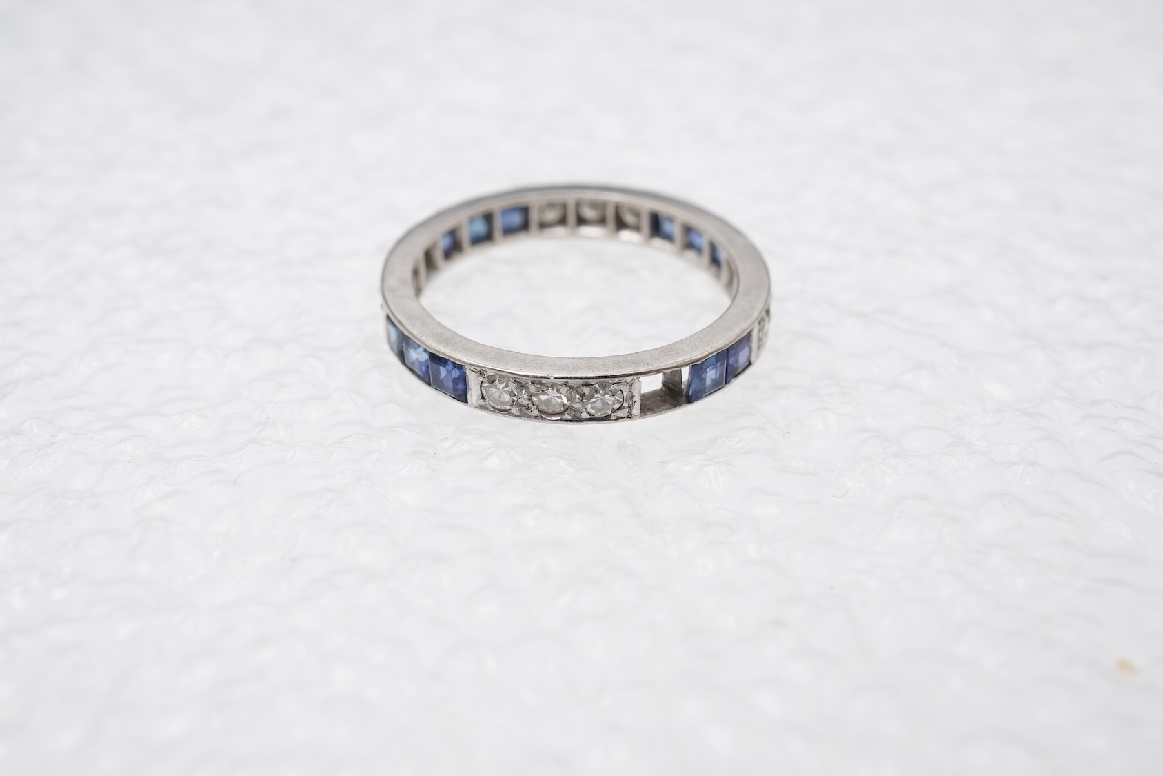 An Art Deco sapphire and diamond eternity ring, 1930s